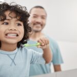 young child brushing teeth, toothbrushes for sensory sensitive kids