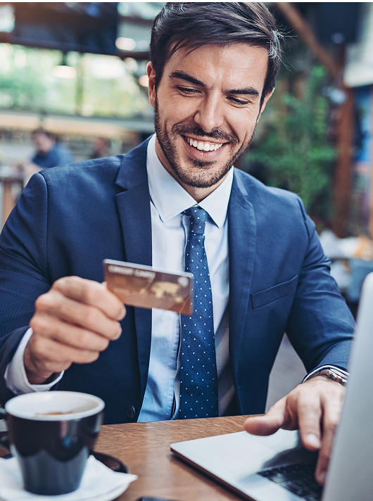 man paying bill online