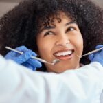 woman at a caring dentist near richardson